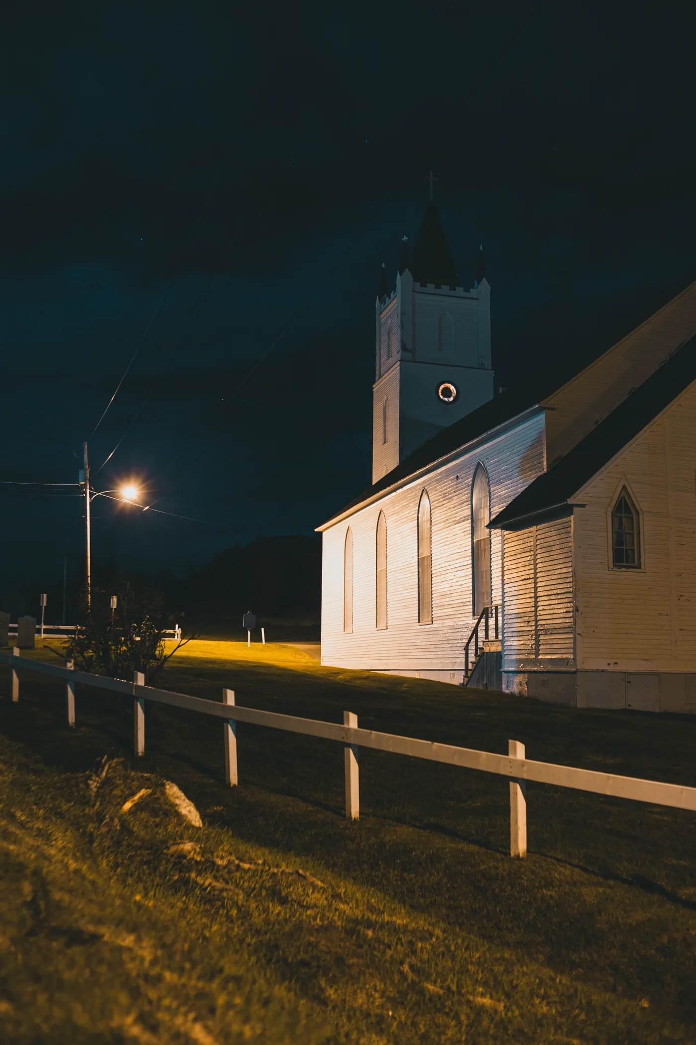 A peaceful, illuminated church at night